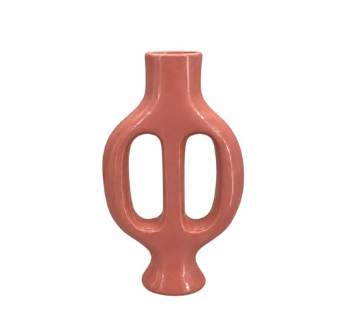 A glossy terracotta-colored ceramic vase with a unique double handle design, isolated on a solid white background.