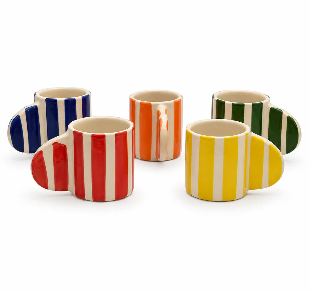 Five ceramic mugs with curved handles, each featuring vertical stripes in different colors: blue and white, red and white, orange and white, green and white, and yellow and white. They are arranged on a clean white background.