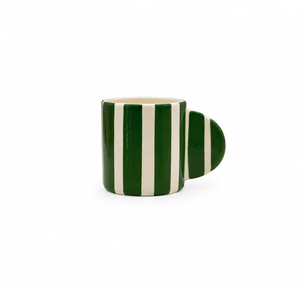 A ceramic mug with a handle shaped like a semicircle, decorated with dark green and cream vertical stripes, on a plain white background.