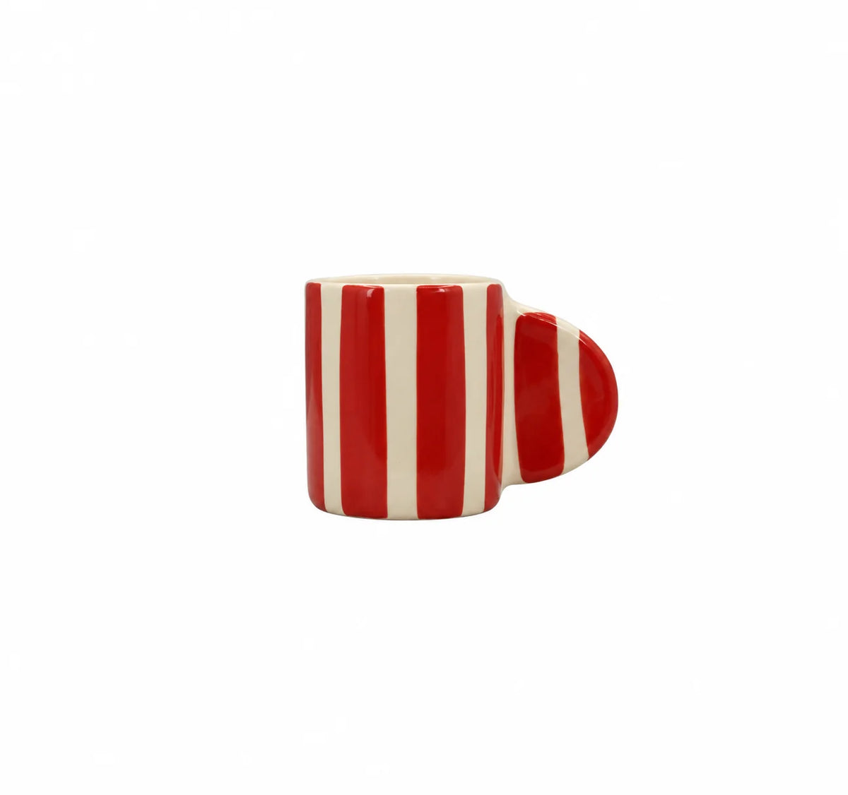 A small ceramic mug with a bold red and off-white vertical stripe pattern, featuring a heart-shaped handle on the right side, set against a plain white background.