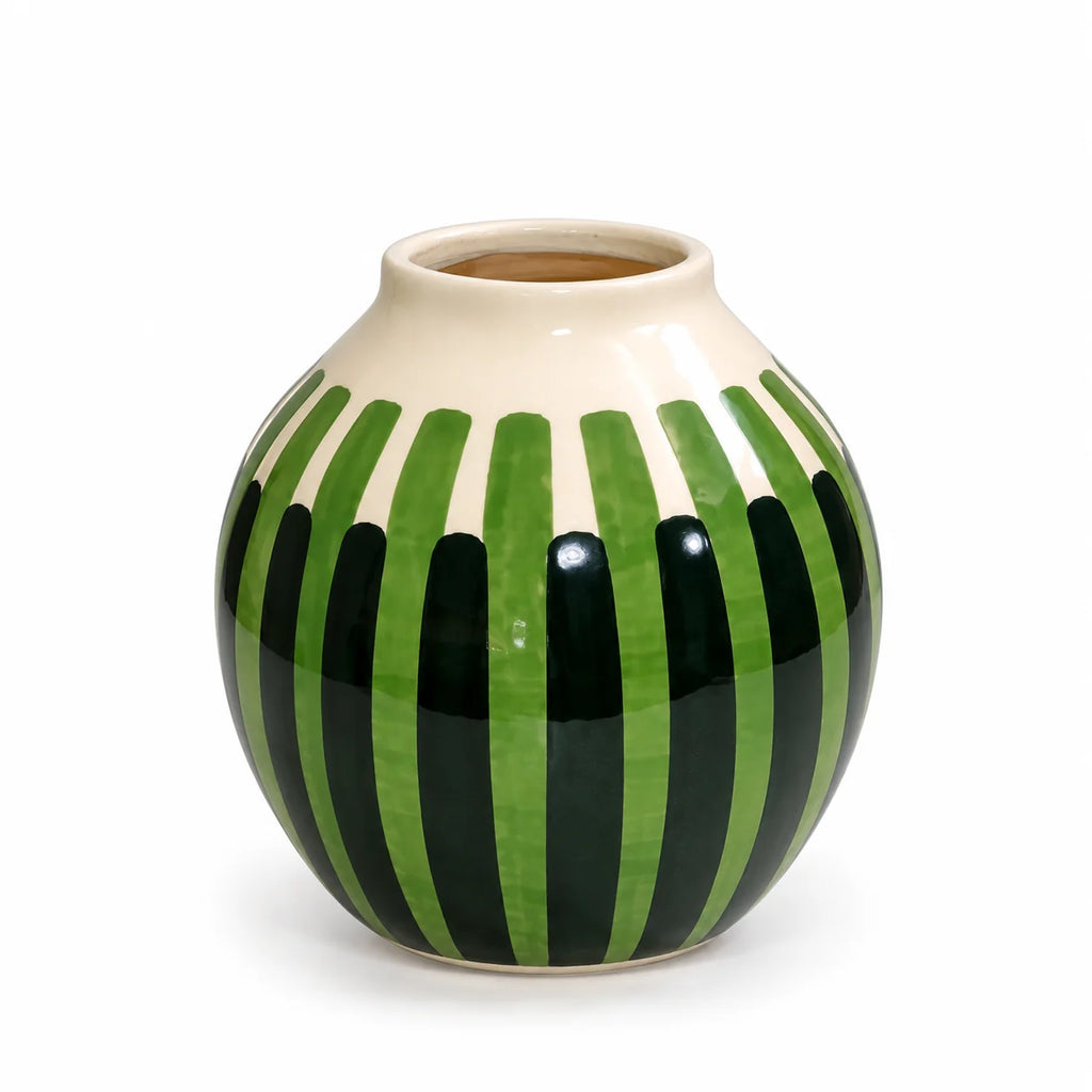 A round ceramic vase with a glossy finish, featuring a cream-colored upper section and a lower section decorated with alternating vertical stripes of bright green and dark green.