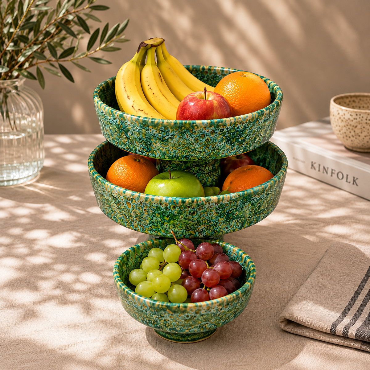 Handmade Moroccan ceramic 3 tier fruit stand in green speckled glaze filled with fresh fruit