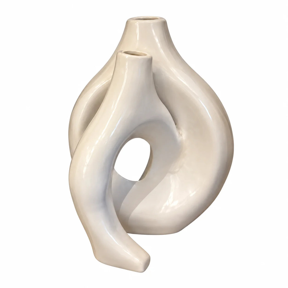 An abstract sculptural ceramic vase with a glossy off-white finish, featuring a curved, organic form with two openings at the top, set against a plain white background.