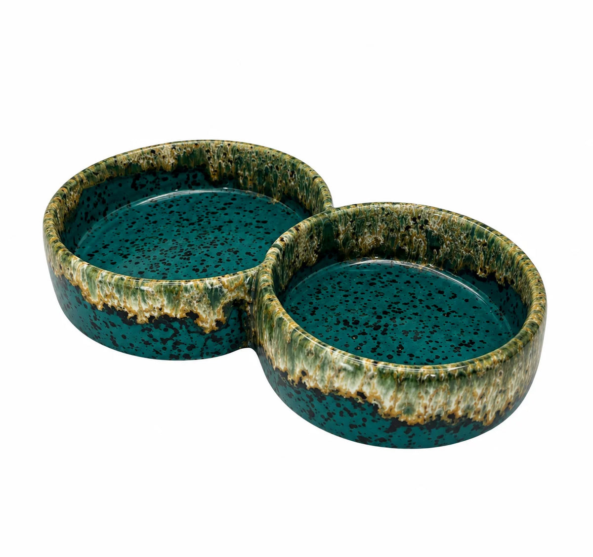 A two-compartment ceramic dish with a deep teal glaze and a textured, melting green and gold rim, shown on a plain white background.